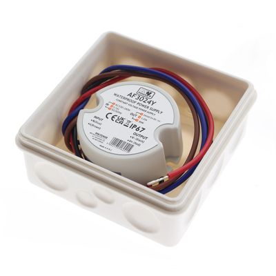 Strichzeichnung eines zylindrischen LED-Controllers, Durchmesser 67 mm, Höhe 25 mm, mit zwei seitlichen Drähten. Ideal für LED-Beleuchtungsanlagen.