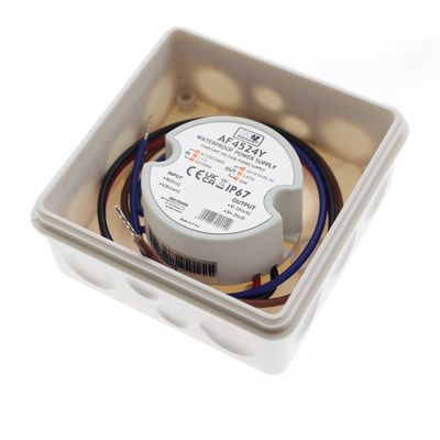 LED-Controller, rundes Design, vit kapsling med märkning, rote, blaue und braune Ledare angeschlossen