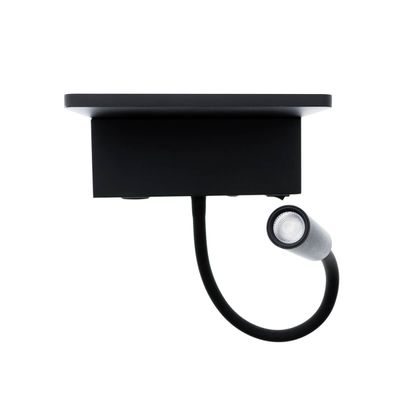 Flexibles schwarzes LED-Leselicht mit zylindrischer Halterung auf einem rechteckigen Sockel, perfekt für eine gezielte Beleuchtung und eine stilvolle, moderne Wohnungseinrichtung.