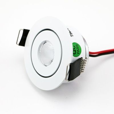 Alternativer Text: Weißes, rundes LED-Modul mit schwarzer Halterung und roten und schwarzen Drähten - perfekt für effiziente Beleuchtungslösungen.