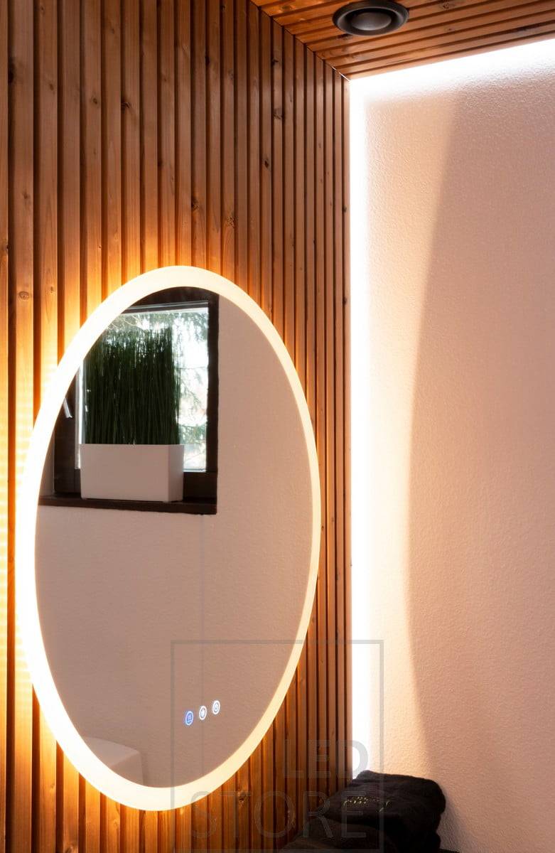 Der große Lichtspiegel MOON und die LED-Leiste hinter dem Paneel sorgen für eine sanfte Beleuchtung im Bad. Sowohl der Spiegel als auch die LED-Leiste sind in der Farbtemperatur einstellbar. Ledstore.fi