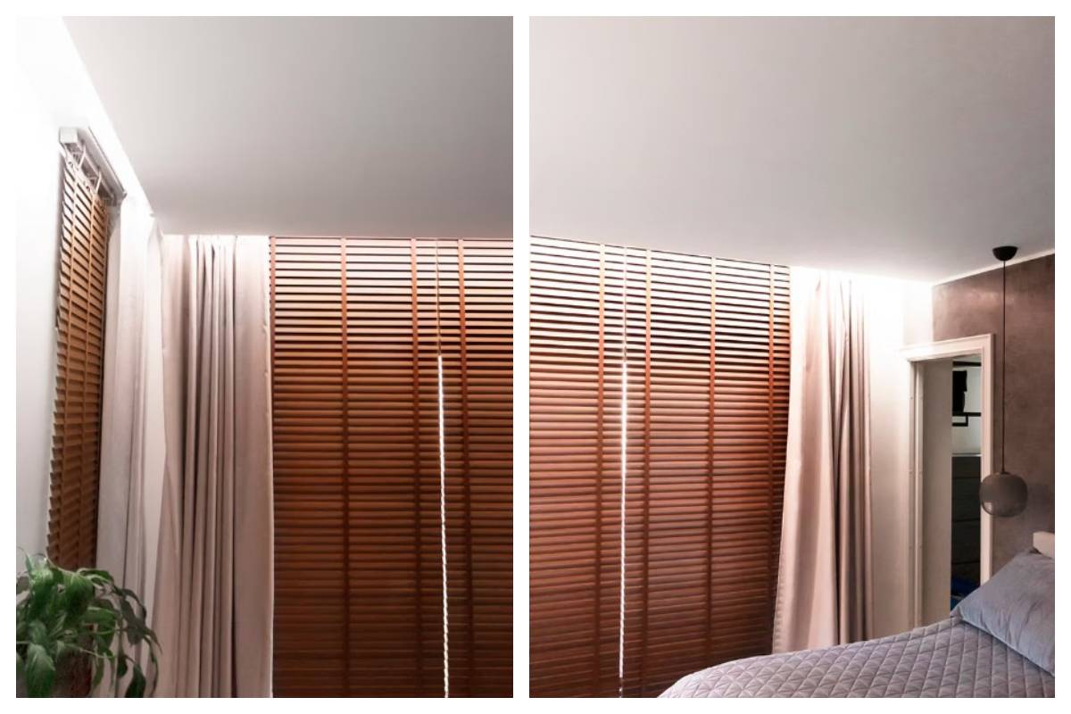 Ein modernes Schlafzimmer in Kaitamäki, Espoo - Holzjalousien, beigefarbene Vorhänge, Grünzeug und ein ordentlich gemachtes Bett schaffen die Atmosphäre eines friedlichen Familienhauses. Ergänzt wird das Ganze durch die sorgfältig entworfene LED-Beleuchtung von LedStore.fi, die die Gemütlichkeit und den Stil des Raumes unterstreicht. 