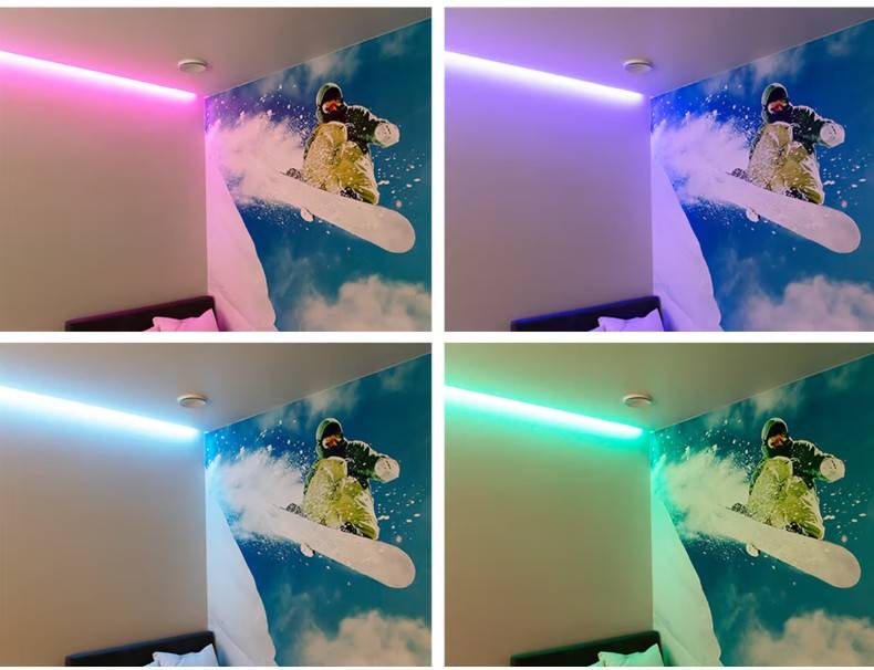 Ein Wandbild zum Thema Snowboard, belebt durch LED-Leuchten von LedStore.fi in austauschbaren Farben - rosa, lila, blau und grün - schafft ein spektakuläres und dynamisches Beleuchtungskonzept im Haus einer Familie aus Espoo in Kaitamäki.